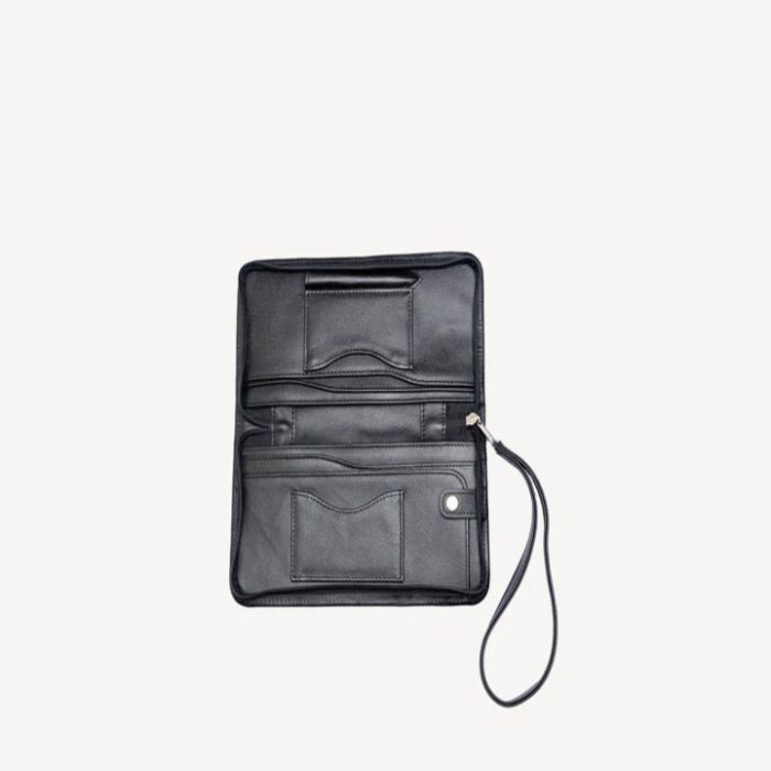 Black travel wallet with zip, open to show card slots